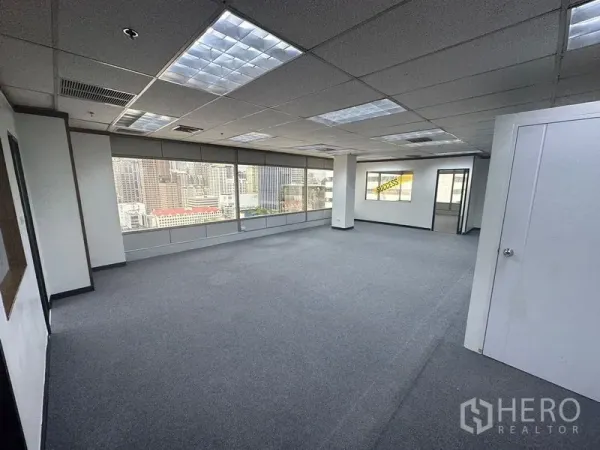 Office Space for rent in Pathum Wan, Bangkok - Large open workspace with a long band of windows providing daylight across the floor.