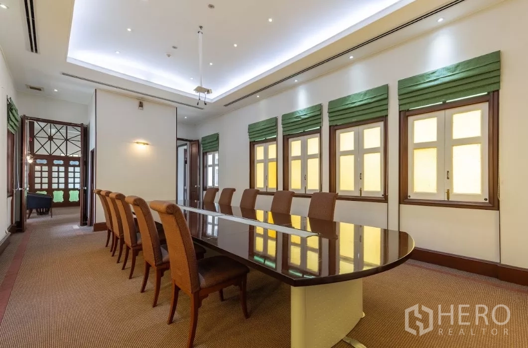Retail Space for rent in Bang Rak, Bangkok - Boardroom with long polished table, upholstered chairs and recessed lighting