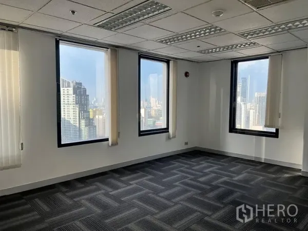 Office Space for rent in Khlong Toei, Bangkok - Corner workspace with three windows and panoramic Bangkok city views.