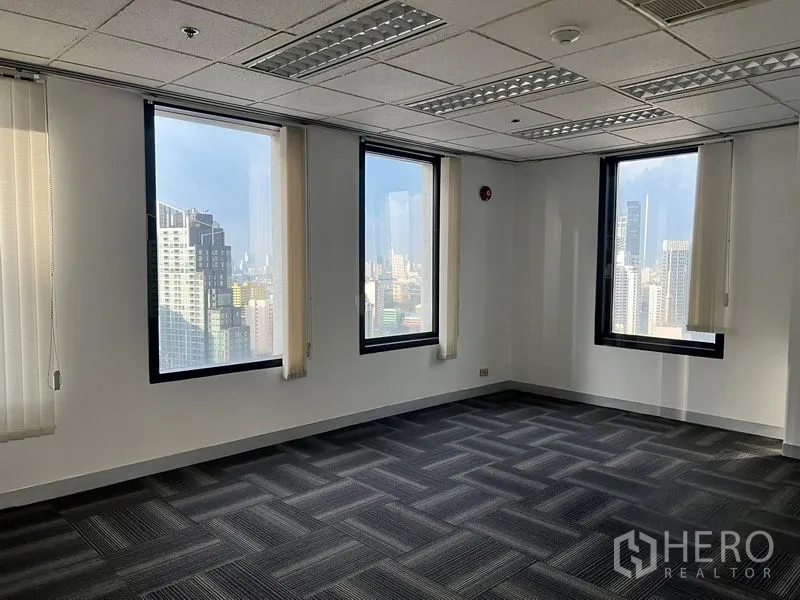 Office Space for rent in Khlong Toei, Bangkok - Corner workspace with three windows and panoramic Bangkok city views.