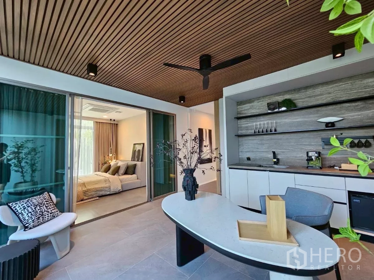 Detached House for rent in Saphan Sung, Bangkok - Multi-purpose room with pantry, ceiling fan, and sliding glass doors to a bedroom.