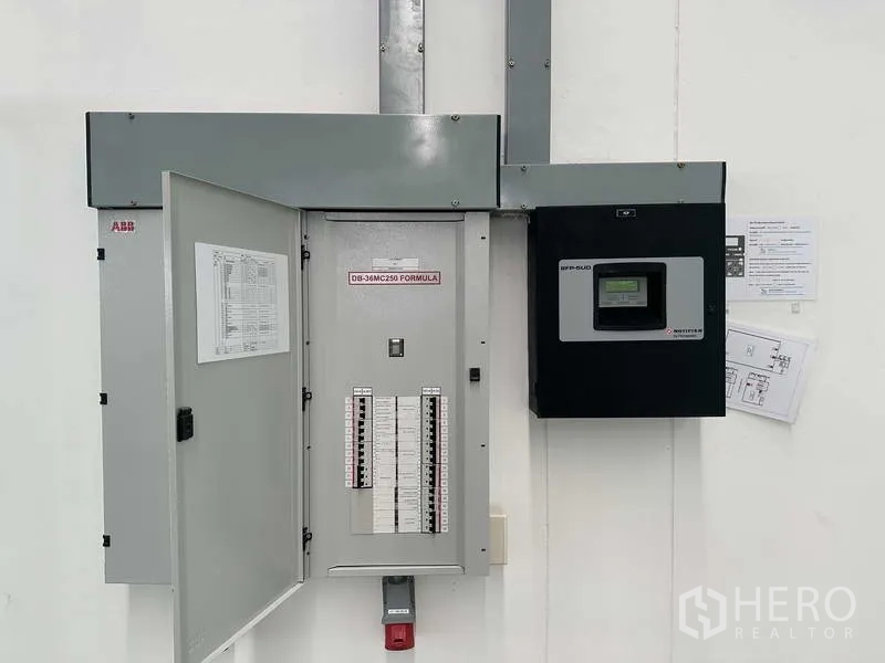 Factory for rent in Bang Sao Thong, Samut Prakan - Electrical distribution board and control panel inside the factory.