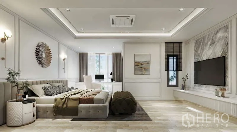 Townhouse for sale - Spacious master bedroom with feature wall, TV console, work desk and wood flooring.