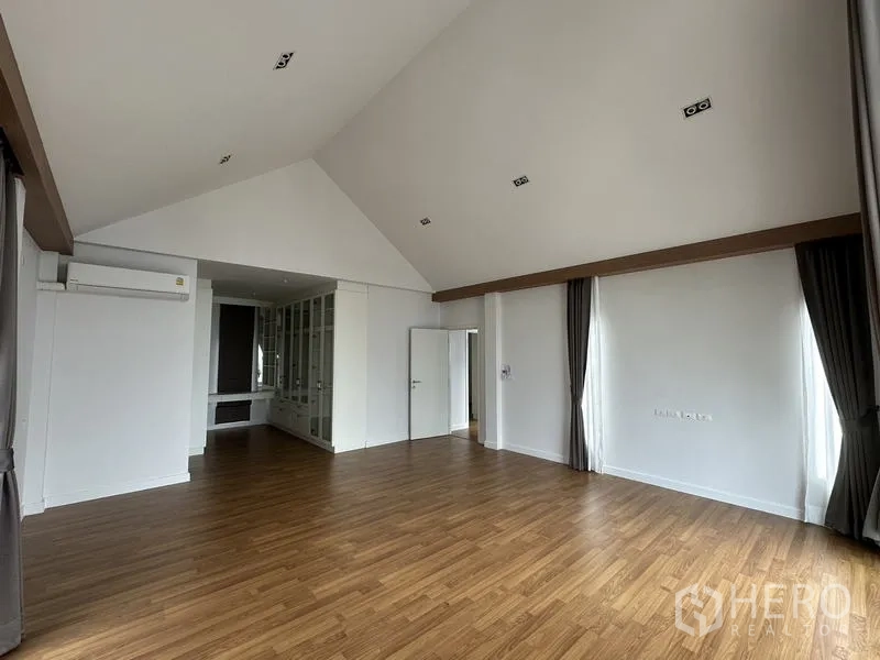 Detached House for sale in Lam Luk Ka, Pathum Thani - Master suite angle showing dressing area and built-in shelves.
