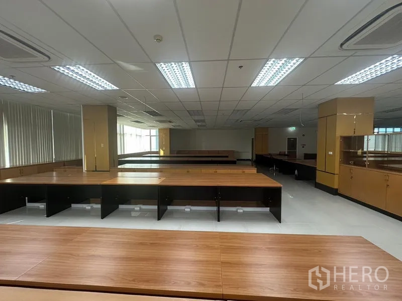 Office Space for rent in Suan Luang, Bangkok - Large office floor with multiple bench desks and natural light