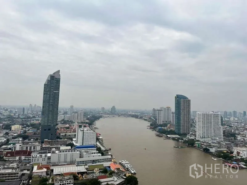 Condominium for rent in Bang Kho Laem, Bangkok - Panoramic city skyline and Chao Phraya River view from high floor.