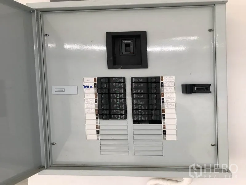 Factory for rent or sale in Bang Bo, Samut Prakan - Industrial electrical distribution panel with clearly labeled breakers.