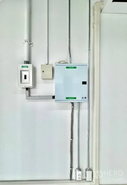Office Space for rent in Khlong Toei, Bangkok - Electrical panel and metal conduits neatly installed on a white wall