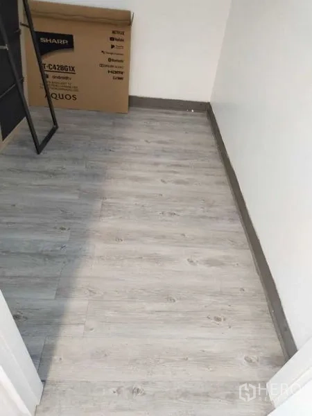 Condominium for rent in Sathon, Bangkok - Small utility or storage room with light gray laminate flooring.