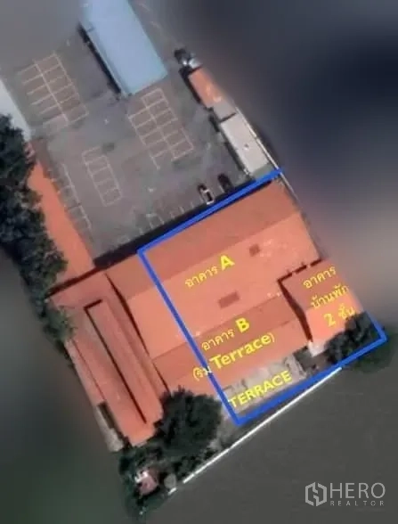 Retail Space for rent in Yan Nawa, Bangkok - Aerial view of low-rise commercial buildings outlined as zones A and B with a riverfront terrace beside the water.
