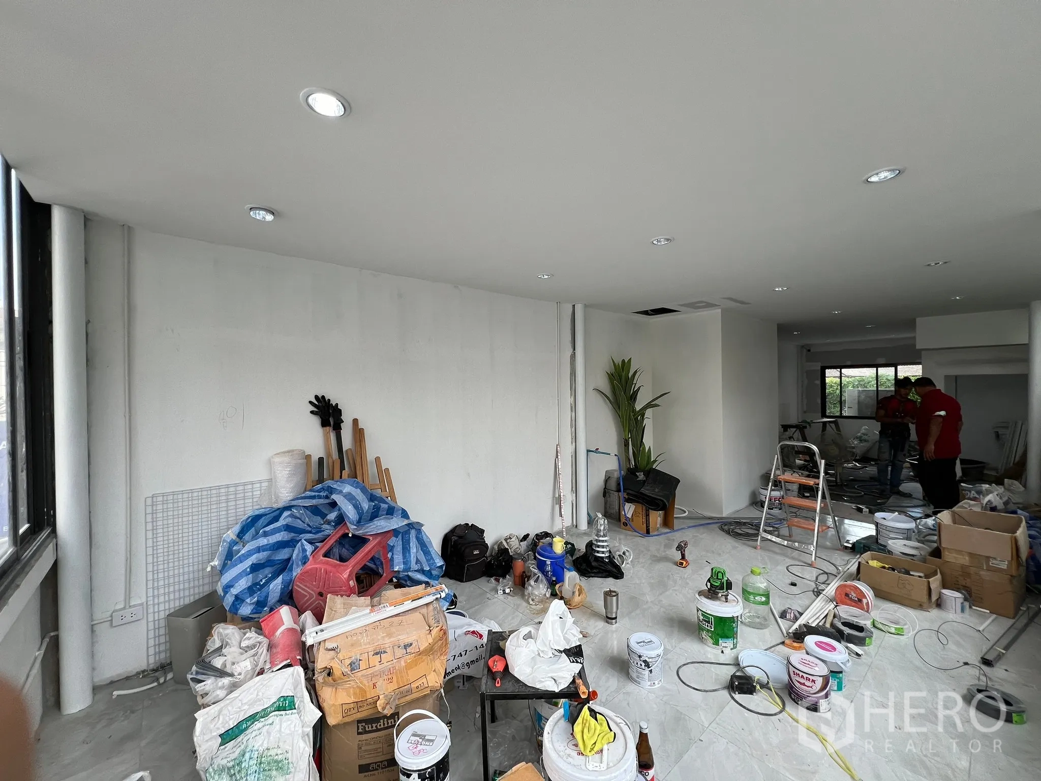 Retail Space for rent in Khlong Toei, Bangkok - Open-plan interior being renovated with ceiling spotlights and large windows.