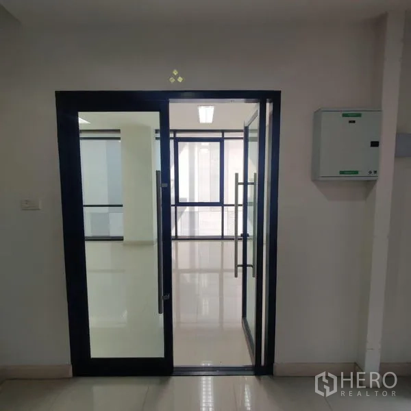 Office Space for rent in Bang Kho Laem, Bangkok - Secure glass entry door leading into the office suite.
