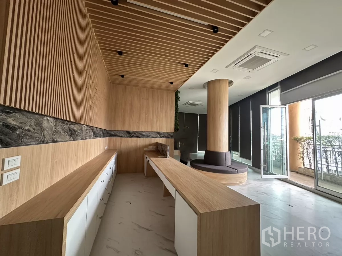 Retail Space for rent in Phra Khanong, Bangkok - Reception perspective with long counters, wood accents, column seating and sliding glass entry.