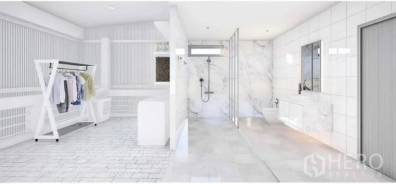 Detached House for rent in Lat Phrao, Bangkok - Walk-in dressing area connected to marble bathroom with glass shower and wide vanity.