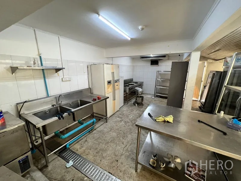 Retail Space for rent in Bangkok - Secondary kitchen with double sink, refrigerators and preparation tables.