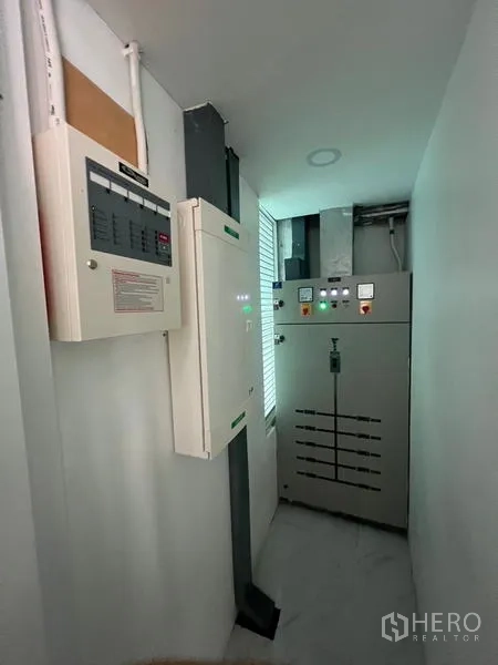 Office Space for rent or sale in Wang Thonglang, Bangkok - Electrical and fire control room with panels and equipment.