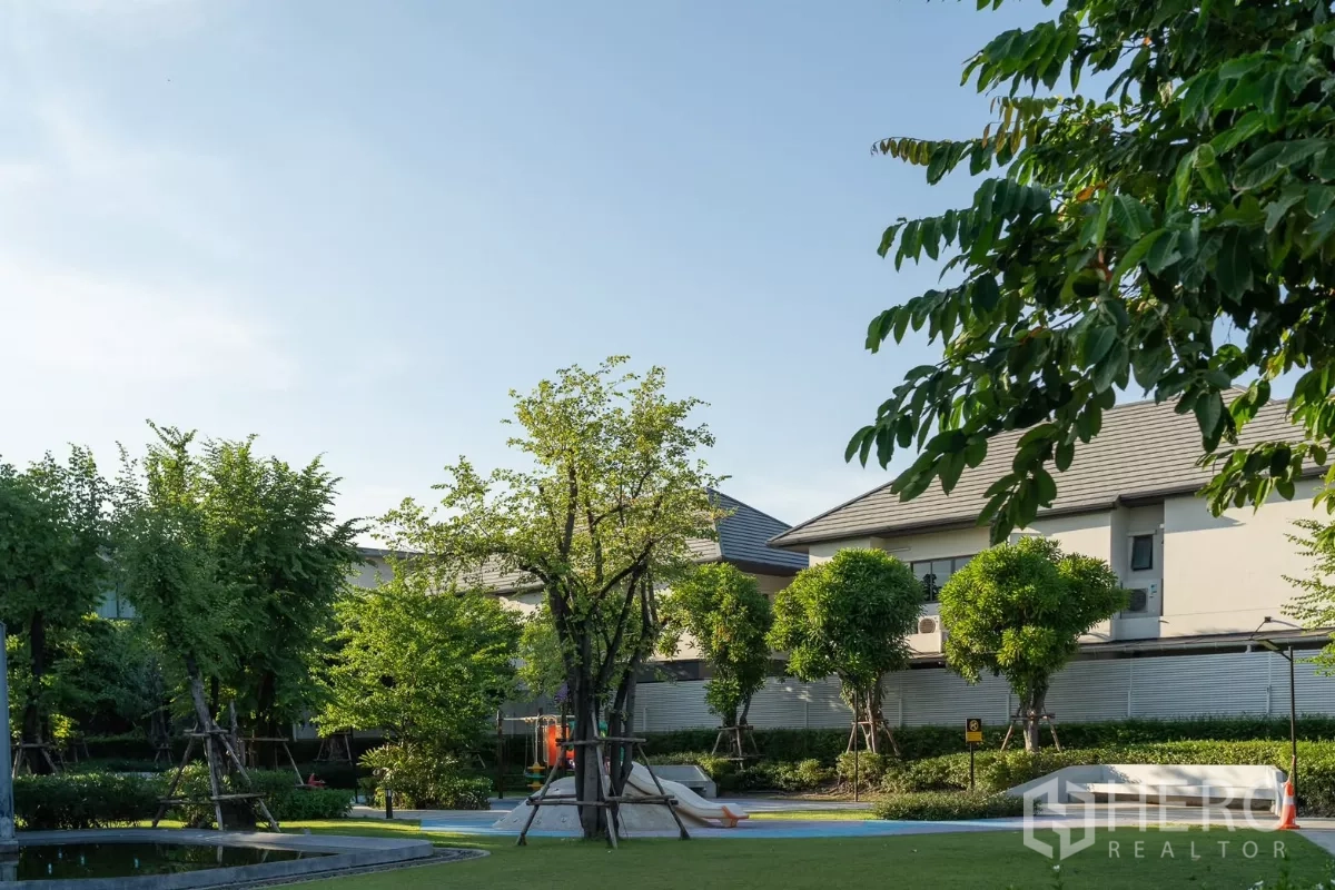Detached House for rent or sale in Saphan Sung, Bangkok - Shaded community park with lawn, trees and a playground.