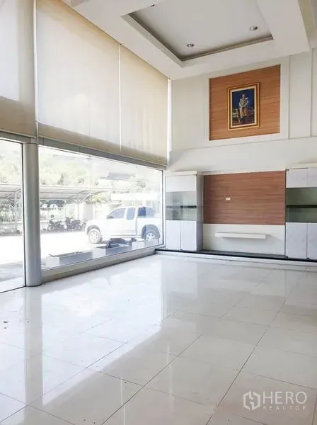 Office Space for rent in Suan Luang, Bangkok - Bright lobby with floor-to-ceiling windows, tiled floors, and roller blinds.