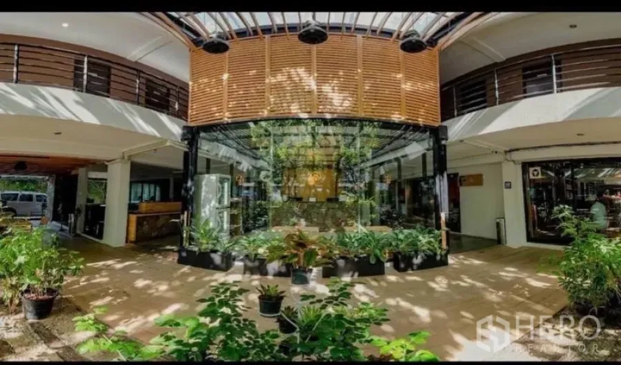 Retail Space for sale in Phra Nakhon, Bangkok - Ground-floor atrium lobby with glass storefront and potted plants.