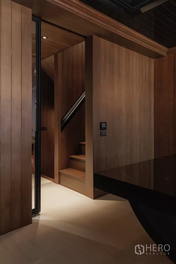 Office Space for rent in Bang Rak, Bangkok - Close‑up of stair nook next to a dark stone meeting table