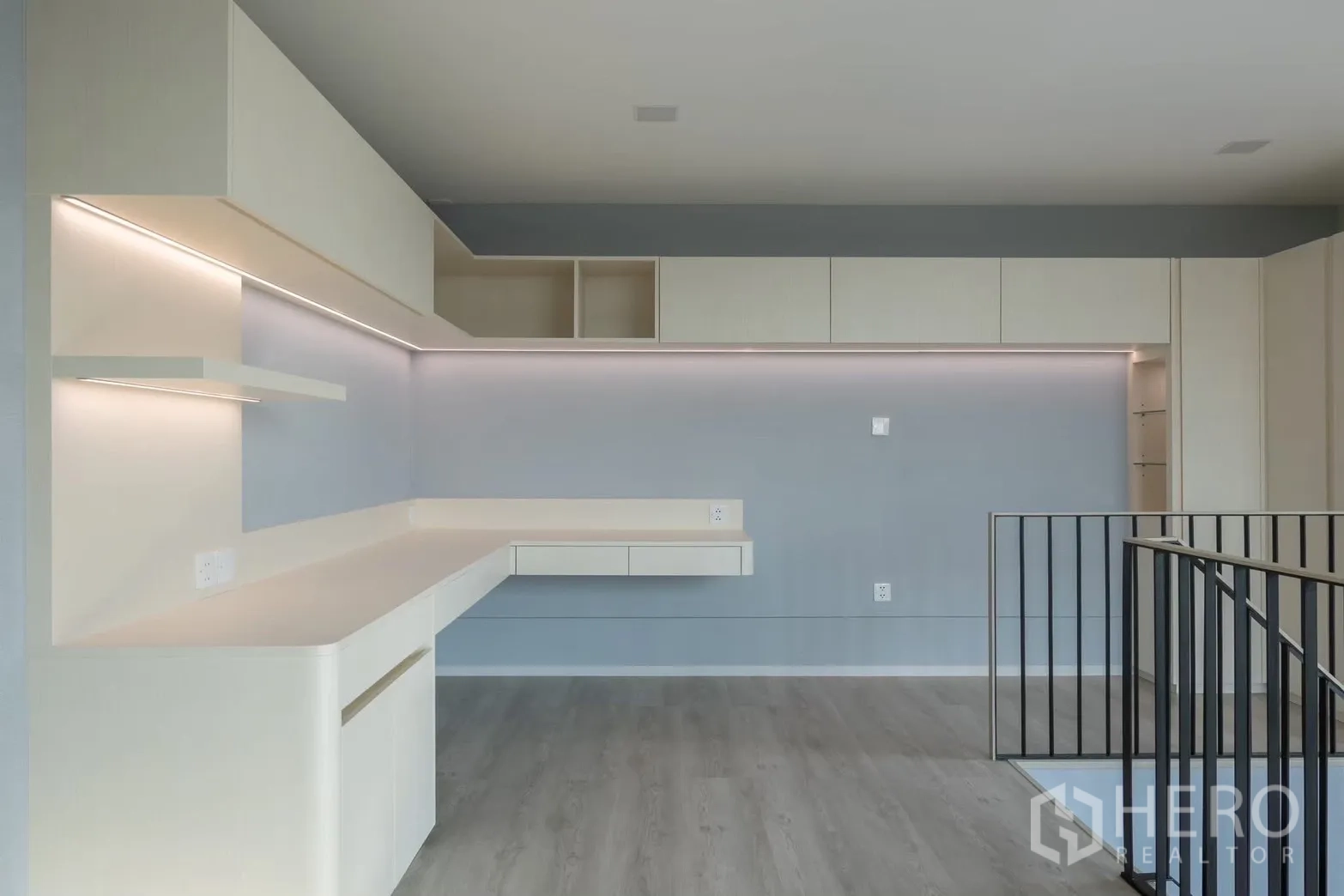 Detached House for rent in Saphan Sung, Bangkok - Mezzanine home office with long built-in desk and storage cabinets.