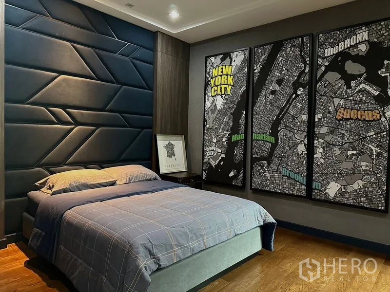 Detached House for rent in Phra Khanong, Bangkok - Stylish bedroom with geometric padded headboard and New York map artwork.