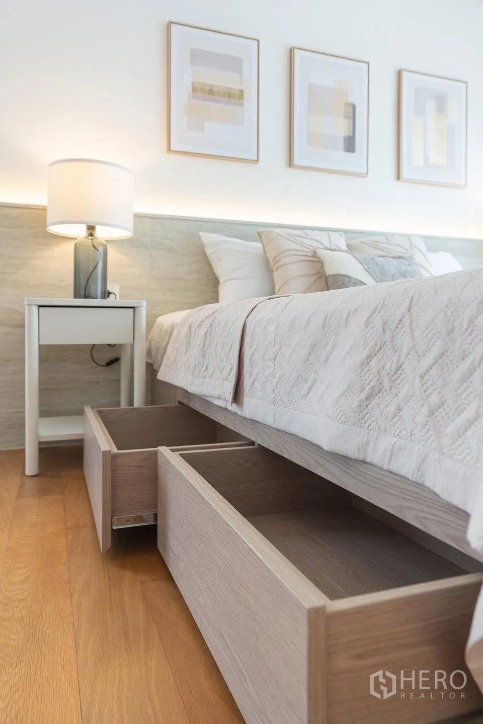 Detached House for rent in Saphan Sung, Bangkok - Close-up of under-bed storage drawers in a light wood frame.