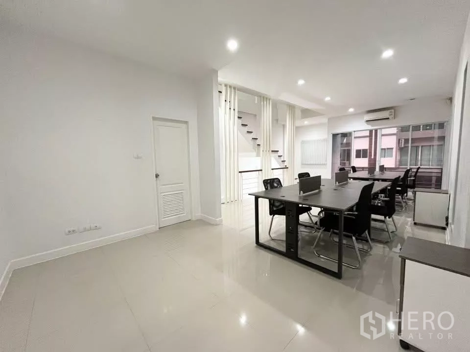 Home Office for rent in Bueng Kum, Bangkok - View across a bright office floor with desks, storage and split air-con.