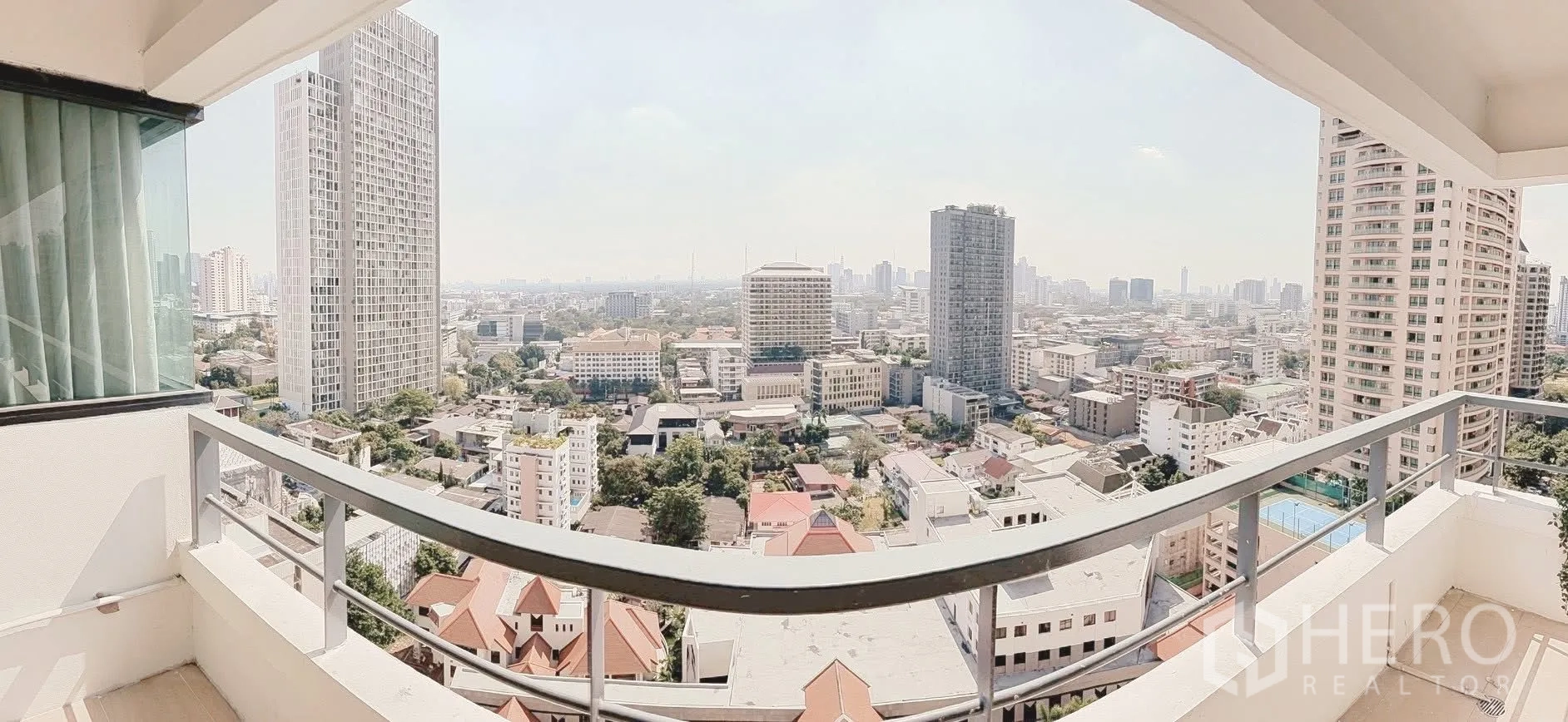 Condominium for rent or sale in Sathon, Bangkok - High-floor balcony with panoramic skyline view over Sathon, Bangkok.