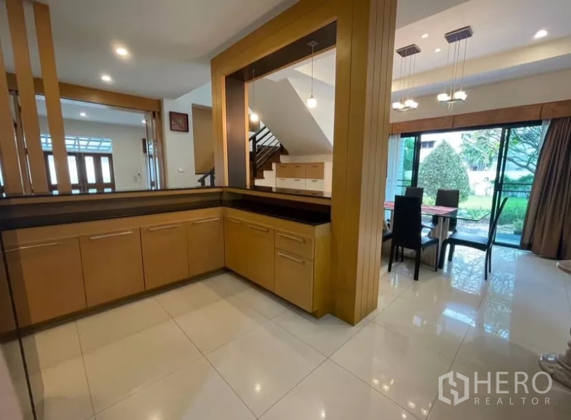 Detached House for rent in Chatuchak, Bangkok - Pantry and serving counter connected to dining area with garden view.