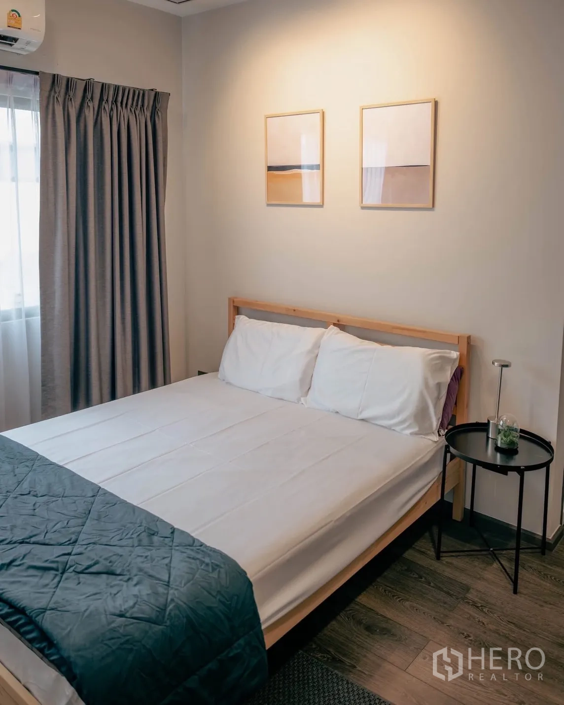 Detached House for rent or sale in Bang Phli, Samut Prakan - Secondary bedroom with queen bed, side table and curtains.