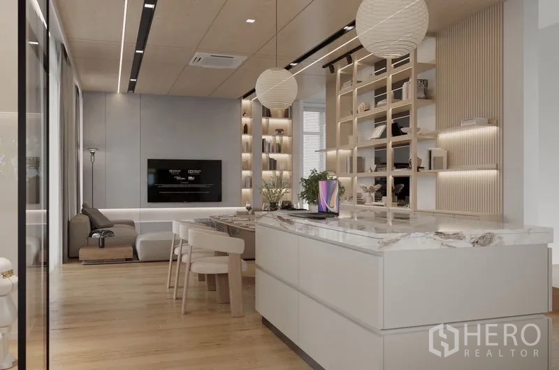 Detached House for rent in Saphan Sung, Bangkok - Open‑plan kitchen, dining and living area featuring a marble island and illuminated shelving.