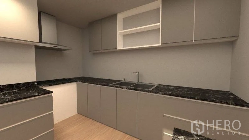 Detached House for rent in Lat Phrao, Bangkok - Close view of L-shaped kitchen with sink, extractor hood and ample storage cabinets.
