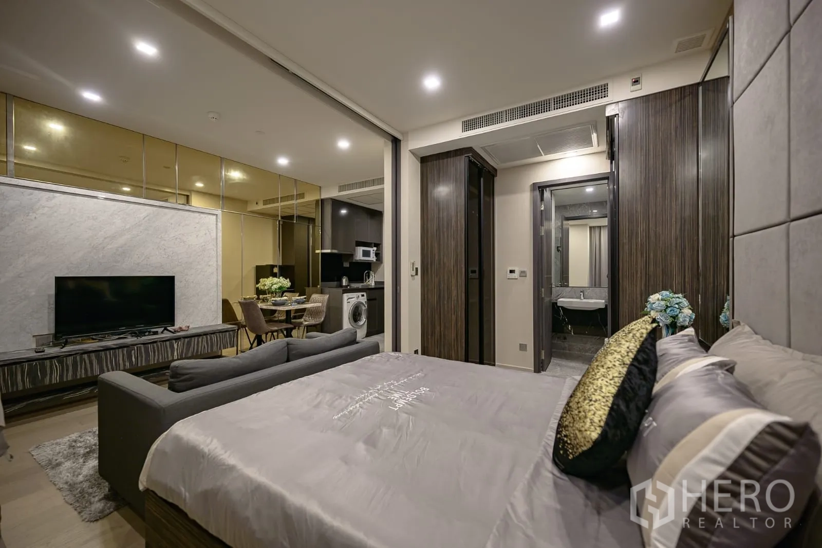 Condominium for rent in Watthana, Bangkok - View from the bed toward the kitchenette and bathroom entrance.