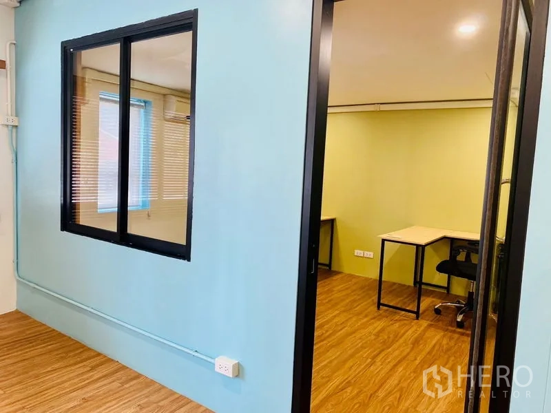 Office Space for rent in Bang Rak, Bangkok - Private office entry with a glass door, desks and natural light.