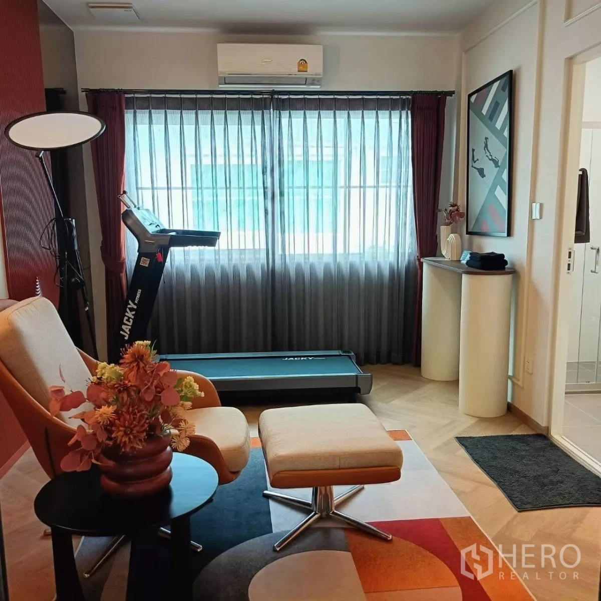 Detached House for rent in Bang Phli, Samut Prakan - Multipurpose room with treadmill and lounge seating beside a bathroom.