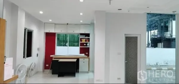 Warehouse for rent in Bang Bua Thong, Nonthaburi - Bright office interior with recessed lighting, built-in cabinetry and large windows
