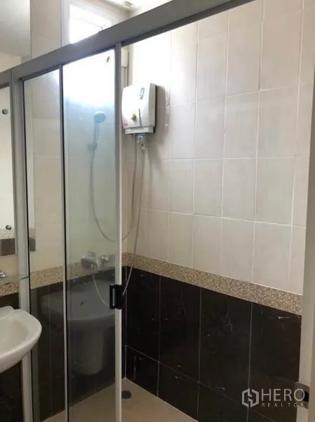 Townhouse for rent in Chatuchak, Bangkok - Glass-enclosed shower with water heater inside a modern tiled bathroom.
