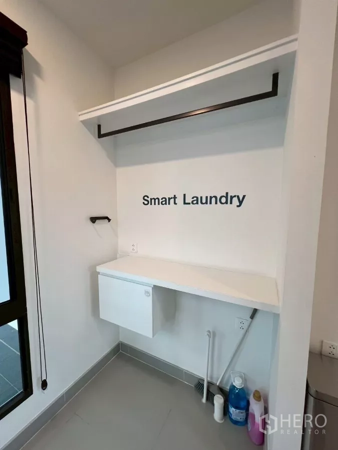 Detached House for rent in Samut Prakan - Smart laundry nook with shelf, hanging rail, and utility hookups.