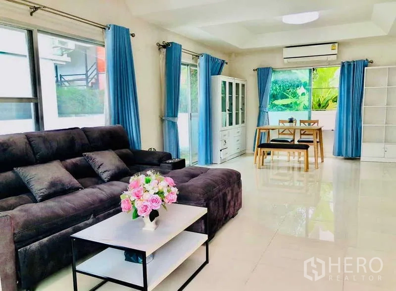 Detached House for rent or sale - Open-plan lounge and dining area with glossy floors and large windows.
