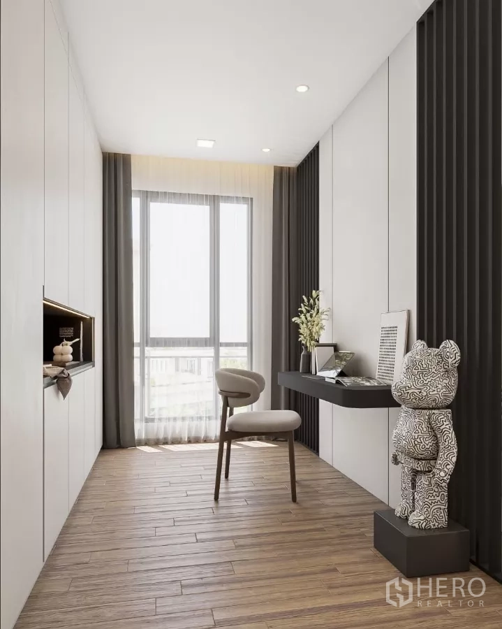 Townhouse for rent in Chatuchak, Bangkok - Multipurpose room with floating desk, built‑in storage and full‑height window.