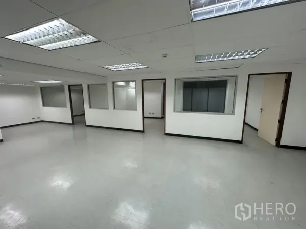 Office Space for rent in Khlong Toei, Bangkok - Central workspace facing internal windows and doors to meeting rooms.