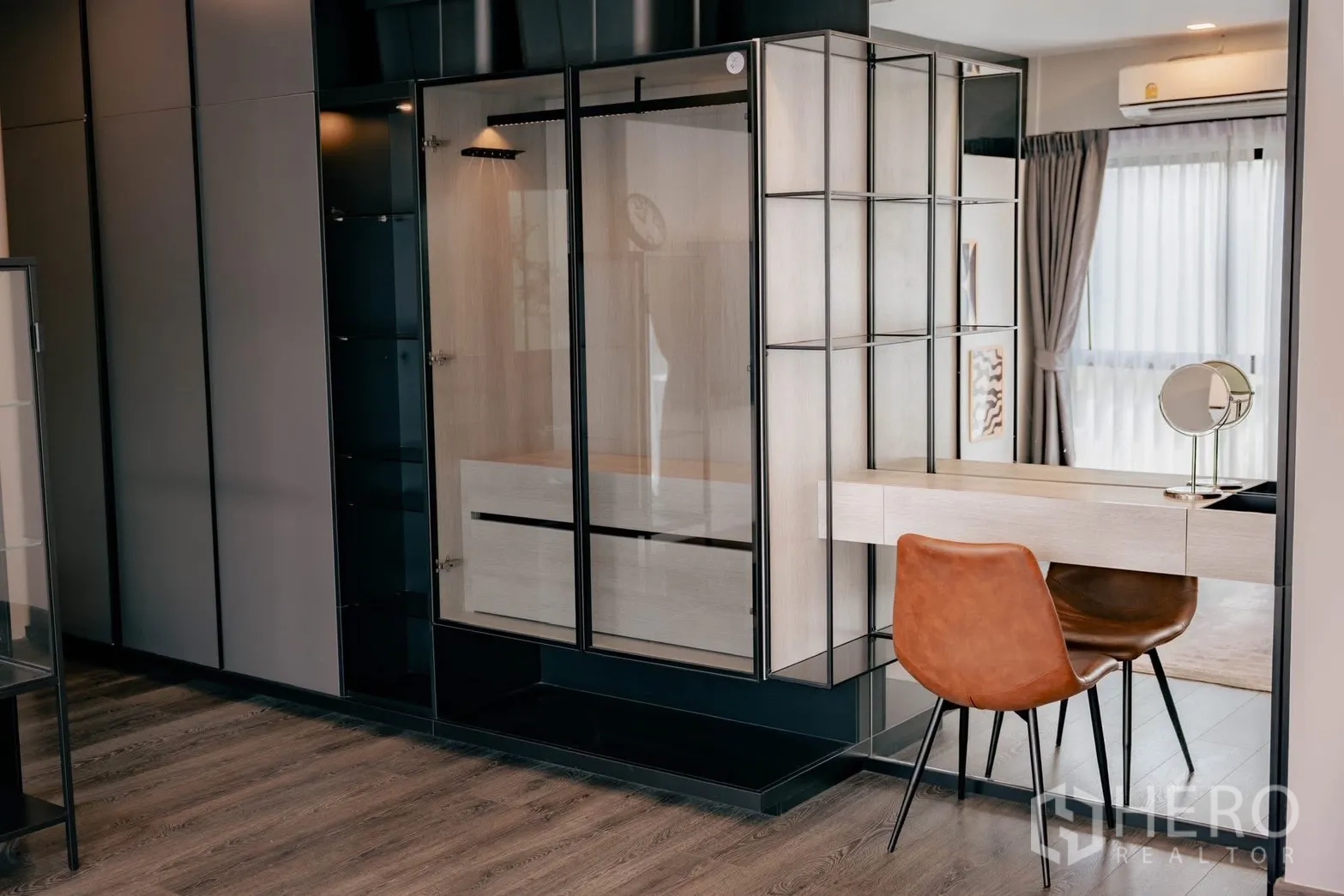 Detached House for rent or sale in Bang Phli, Samut Prakan - Walk‑in closet and vanity with glass wardrobes and mirror.