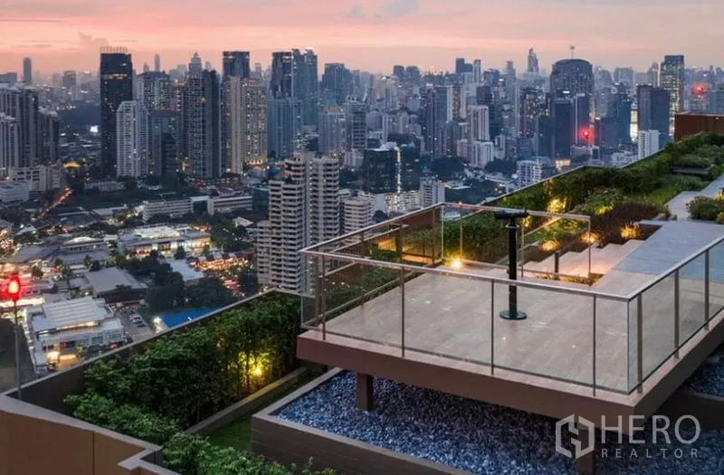 Condominium for rent - Rooftop sky garden terrace overlooking the city at sunset.