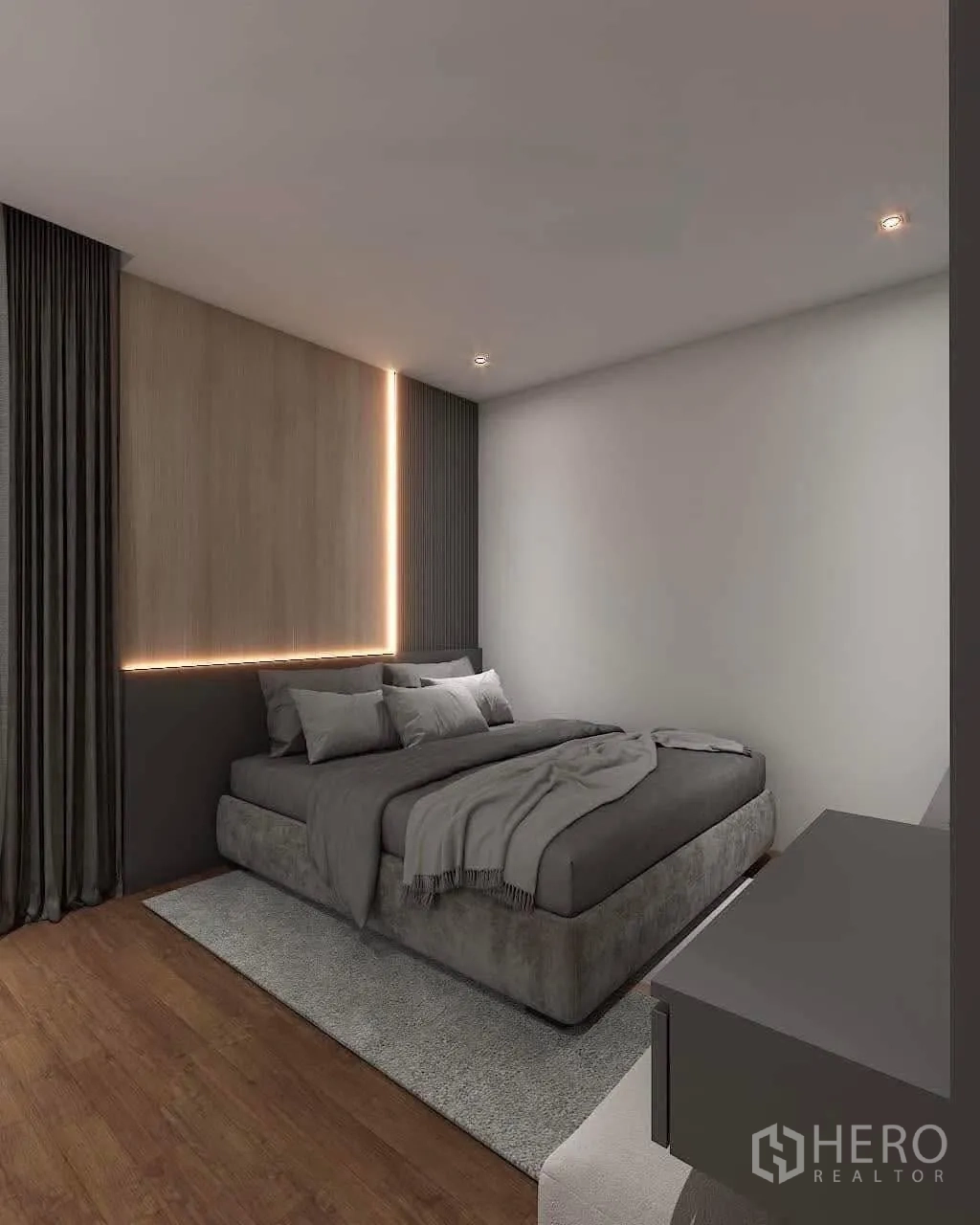 Townhouse for rent in Bang Kapi, Bangkok - Spacious bedroom with feature lighting, curtains and a large bed.