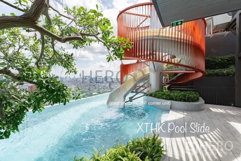 คอนโด ให้เช่าหรือขาย - สระว่ายน้ำดาดฟ้าวิวเมืองพร้อมสไลเดอร์แบบเกลียว