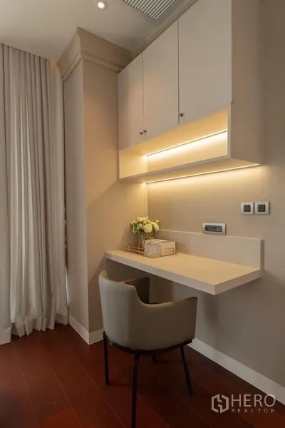 Condominium for rent in Watthana, Bangkok - Detail of floating work desk with task lighting, cabinets and chair.