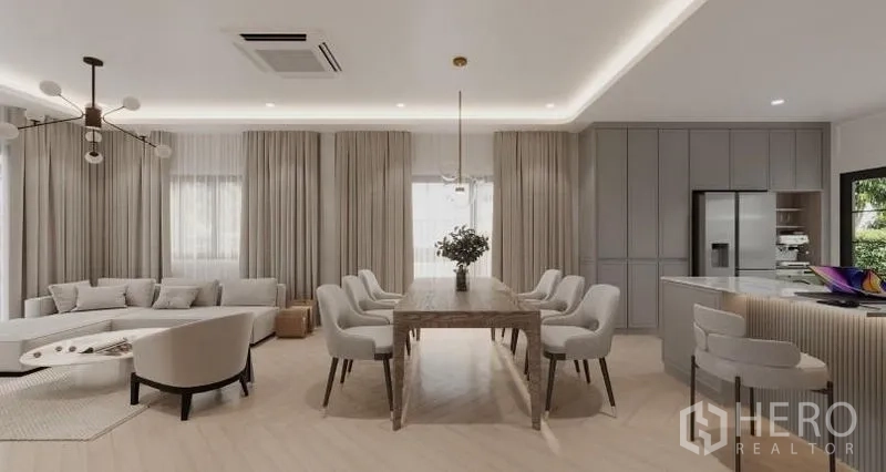 Detached House for rent in Bang Phli, Samut Prakan - Panoramic view of open-plan lounge and dining toward kitchen with full-height windows.