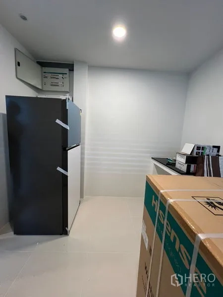 Detached House for rent or sale in Bang Phli, Samut Prakan - Compact pantry or utility kitchen with refrigerator and countertop.
