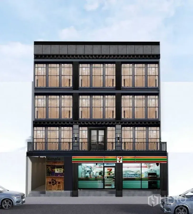店屋 出租在Watthana, Bangkok - 四层临街商铺楼外立面，大面积格栅窗与阳台，一层为零售店面，位于曼谷市中心。